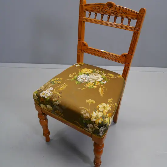 Edwardian oak carved back dining chair with floral print upholstered seat, brackets added to rear legs H900 W470 D460