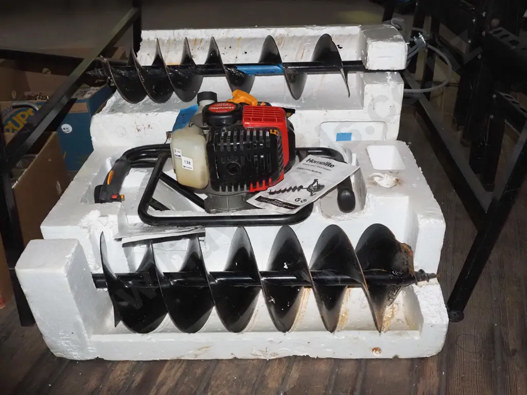 Homelite 2 stroke post hole borer with 2x augers Image 1++