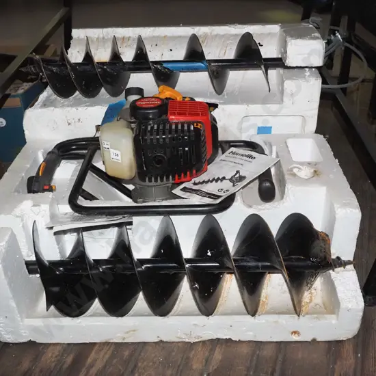Homelite 2 stroke post hole borer with 2x augers