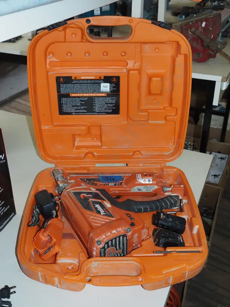 Paslode nail gun - batteries in office Image 1++