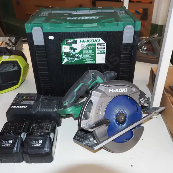 Hikoki battery powered skilsaw with carry case, charger, 2x batteries - batteries in office