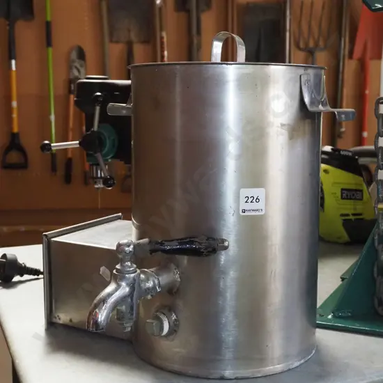 small stainless steel tea urn