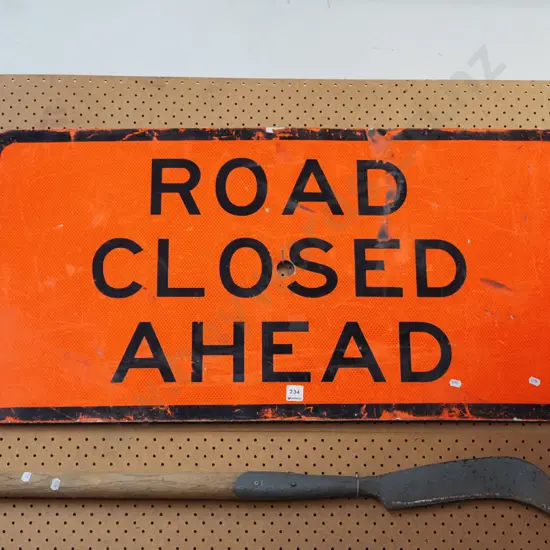 decommissioned road closed ahead sign
