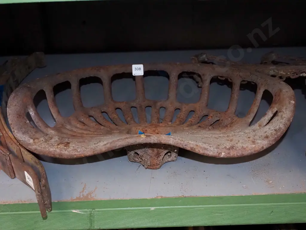 rusty vintage tractor seat Image 1++