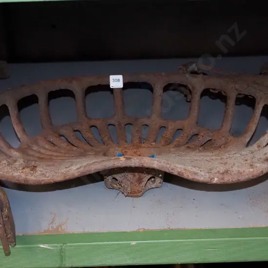 rusty vintage tractor seat