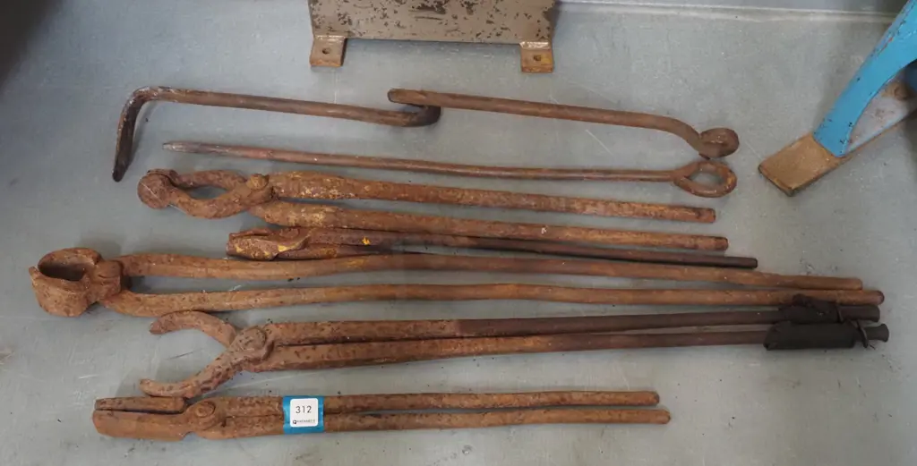 assorted rusty blacksmith tools Image 1++