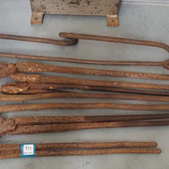 assorted rusty blacksmith tools