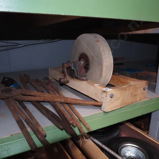 blacksmith tongs and wood framed sharpening/grinding wheel