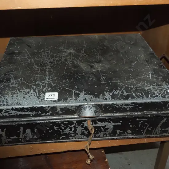 lockable metal case - key in office