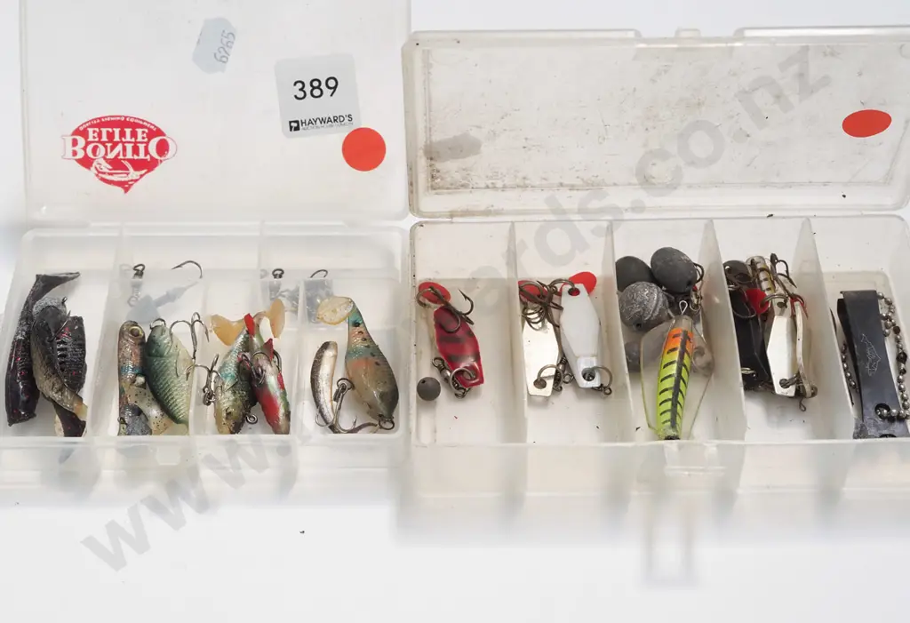 2x cased fishing lures - red dots Image 1++