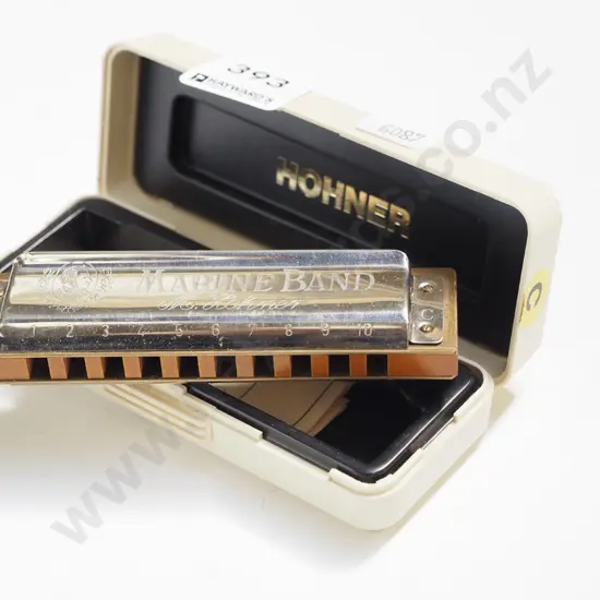 cased  Hohner marine band harmonica
