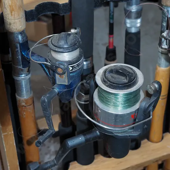 2x fishing  rods and reels - blue dots