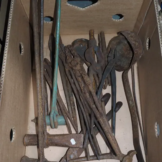 box; rusty blacksmith's tools