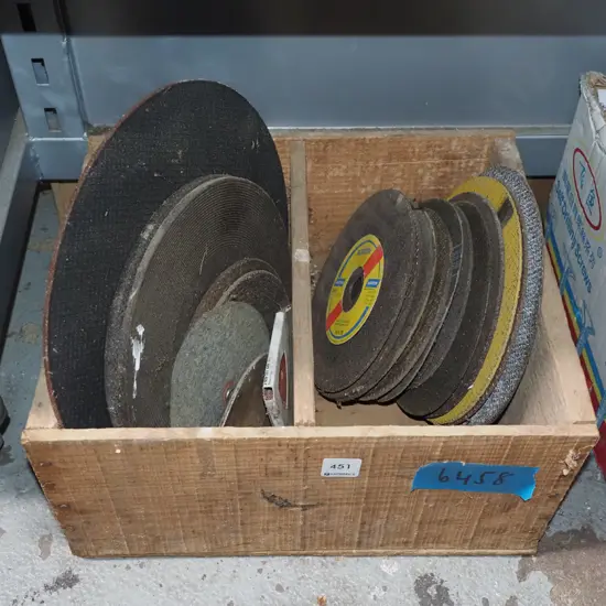 wooden box of cut off discs