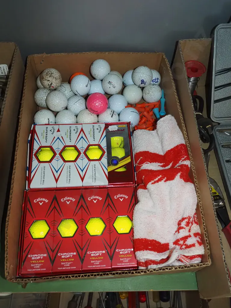 box; golf balls, tees, towel Image 1++