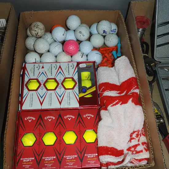 box; golf balls, tees, towel