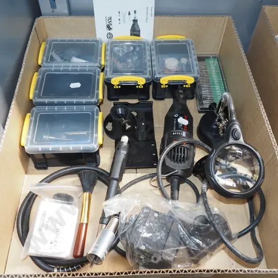 Dremel tool, magnifying glass, various accessories