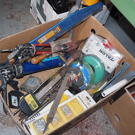 box; caulking guns, tape measures, shelf brakets etc