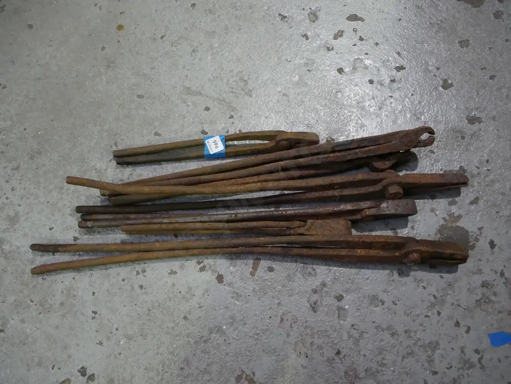 bundle of rusty blacksmith tongs Image 1++