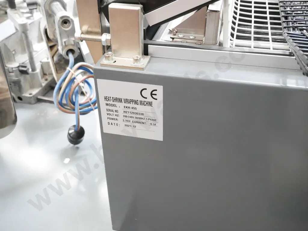 commercial heat shrink wrapping machine with additional roll of wrap Image 1++