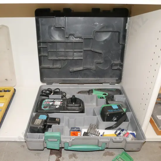 Hitachi cased battery drill with charger and 2x batteries - batteries in office