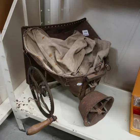 vintage hand operated seed spreader