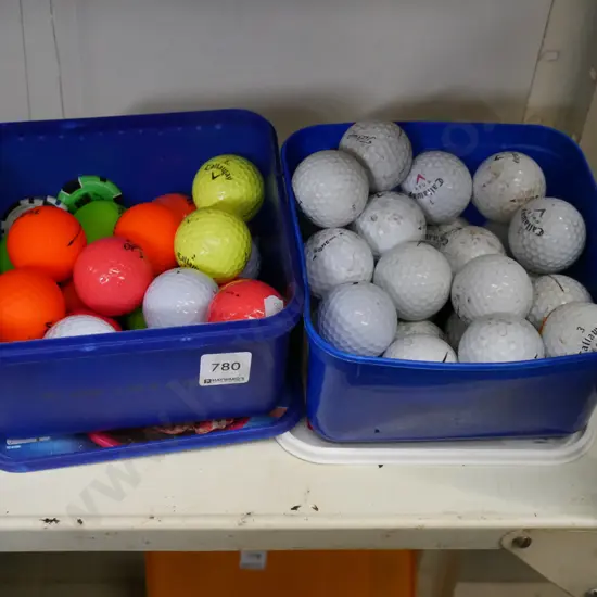 2x tubs of golf balls