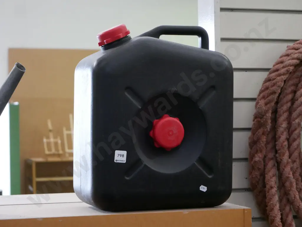 black plastic oil change container Image 1++