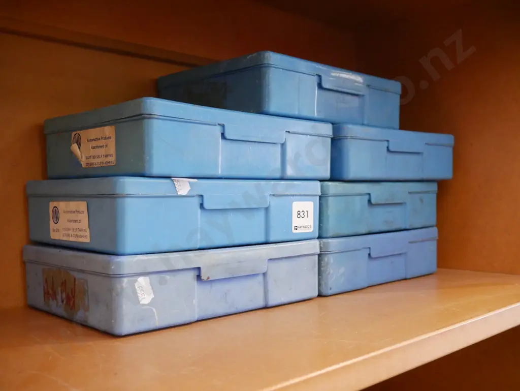 7x blue containers of automotive products Image 1++