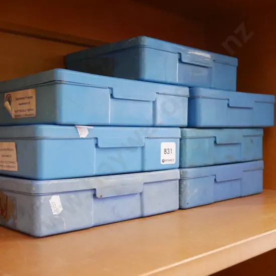 7x blue containers of automotive products