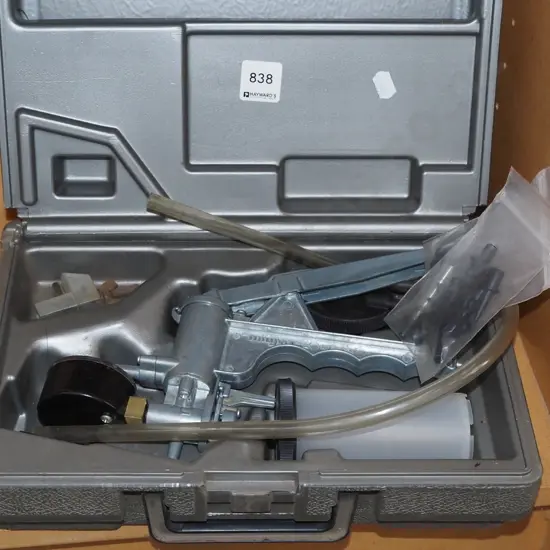 cased automotive vacuum tester