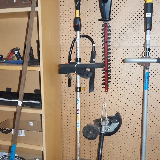 Homelite multi tool with hedge trimmer attachment, lawn edge cutter