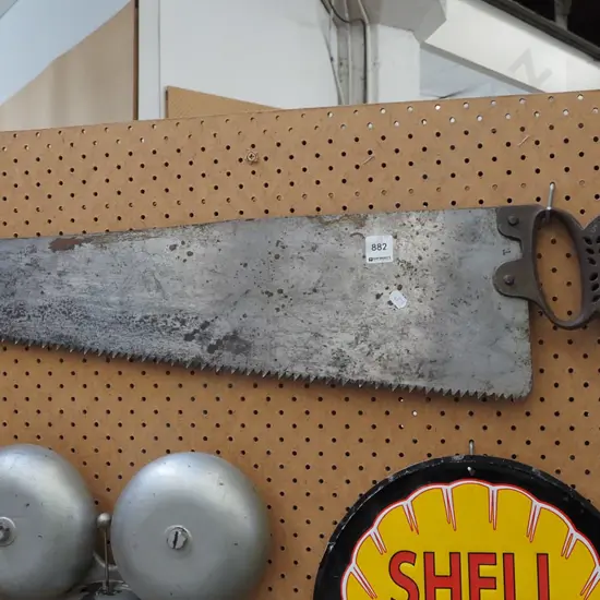 hand saw, canvas bag