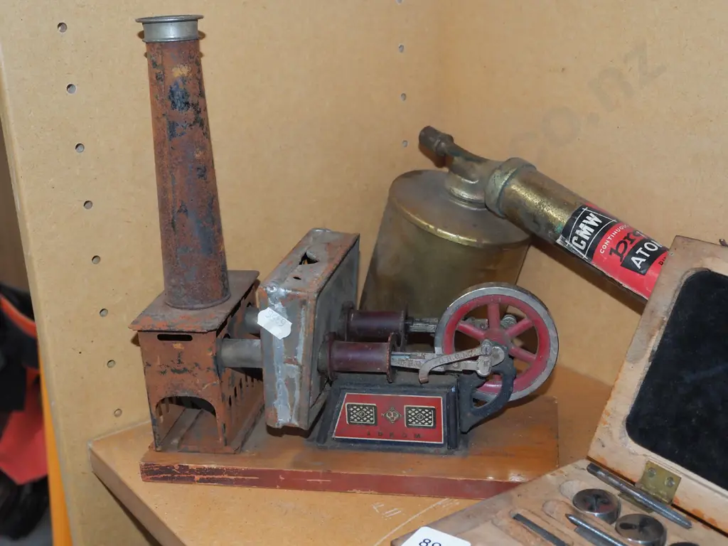 small wood cased tap and tie set, brass garden sprayer, tin steam engine Image 1++