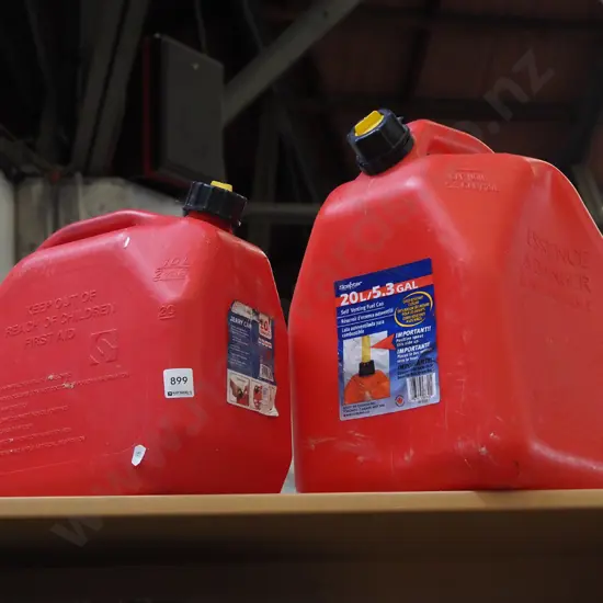 2x red plastic fuel containers