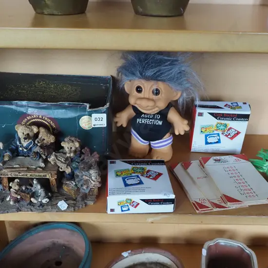shelf; coasters, troll, Bear Boyds figurines etc