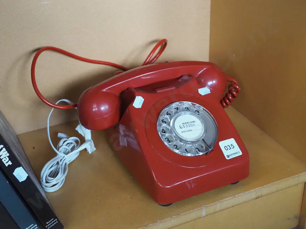 red plastic dial telepone Image 1++