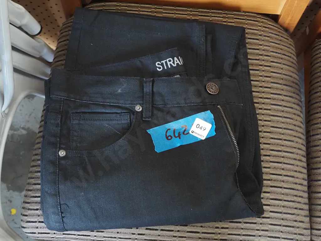 pair of size 87/34 black denim jeans Image 1++
