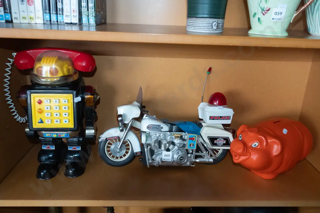 childrens toys; robot, piggy bank, damaged police motorcycle Image 1++