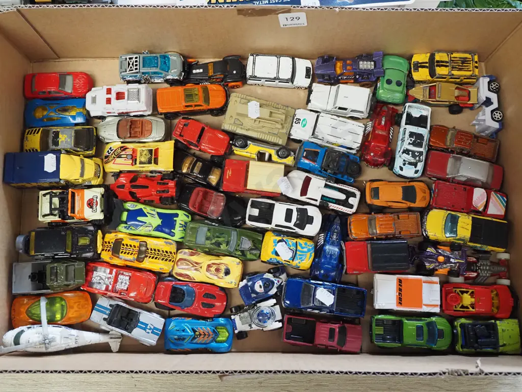 box; assorted toy vehicles Image 1++