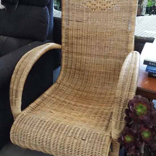 woven cane armchair