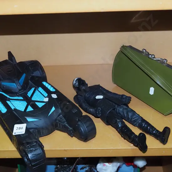 toy Bat mobile, Star Wars figurines, clutch purse