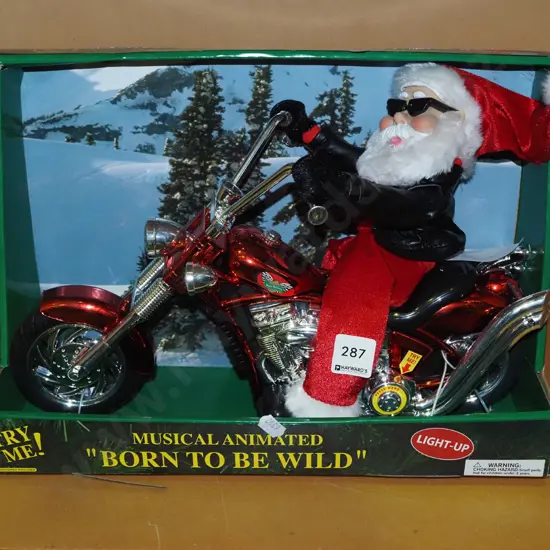 box; musical motorcycle Santa