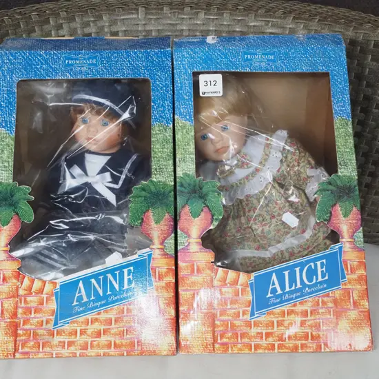 2x boxed porcelain dolls