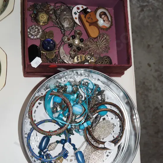 tin and box of costume jewellery - red dots