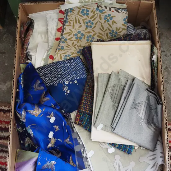 box of fabric pieces