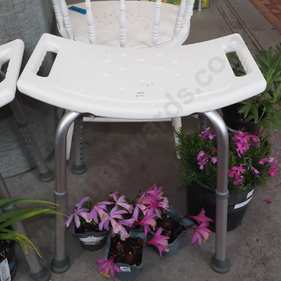 white plastic shower stool