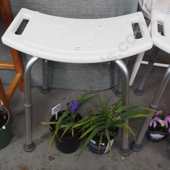 white plastic shower stool