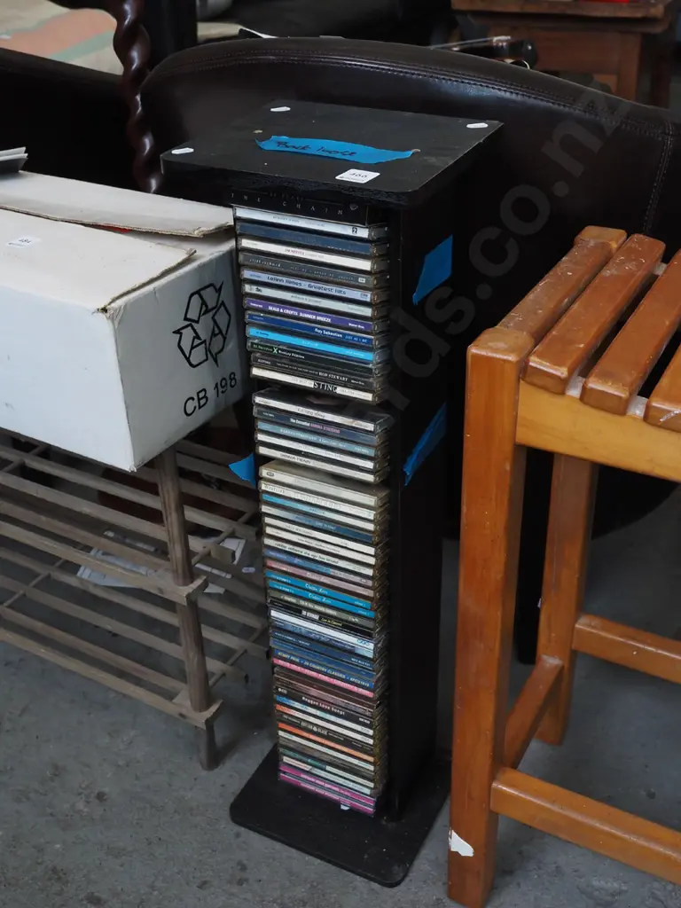 CD tower and CDs - back is loose Image 1++