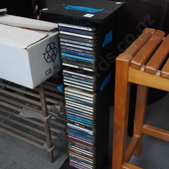 CD tower and CDs - back is loose